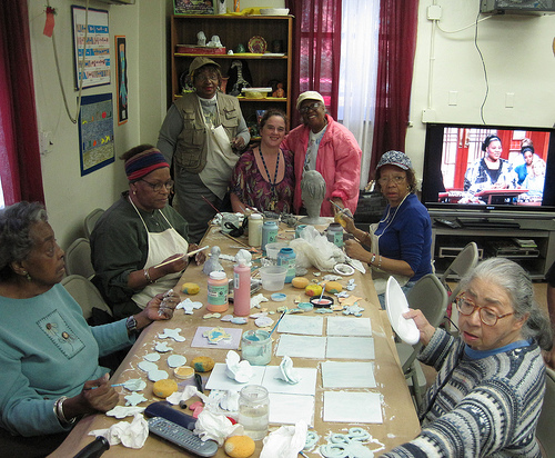 Group glazing tiles at Frederick Douglass Senior Center