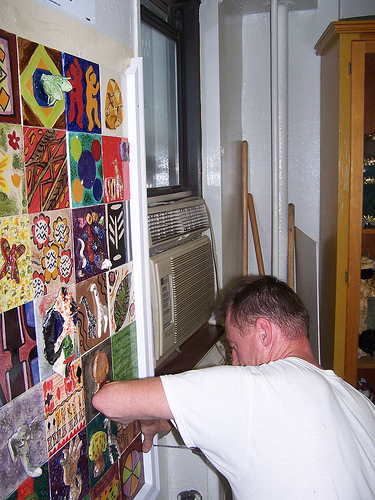 Ceramic art mural installation at Langston Hughes Senior Center.