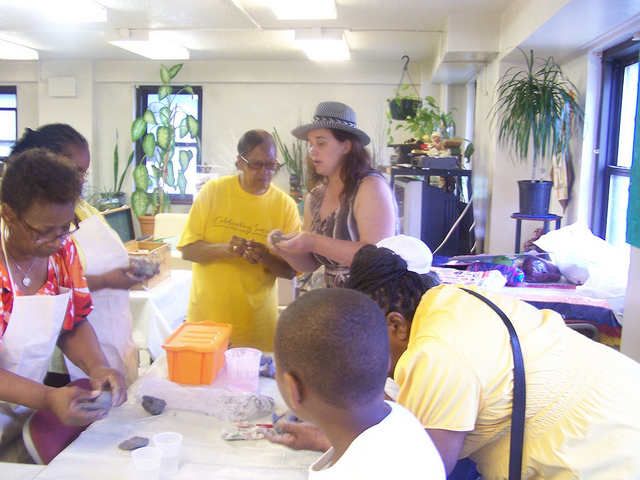 Sculpting instruction at Langston Hughes Senior Center.